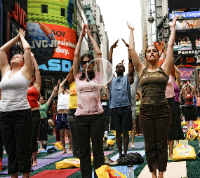 Times Square Yoga (via <a href="http://www.timessquarenyc.org/about_us/events_solstice.html">Times Square Alliance</a>)